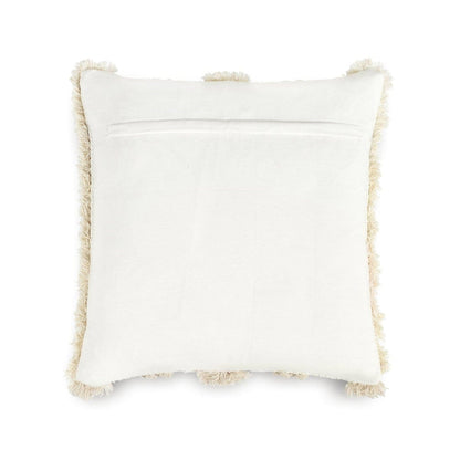 Detailed view of tufting and woven texture on the ivory cotton pillow cover